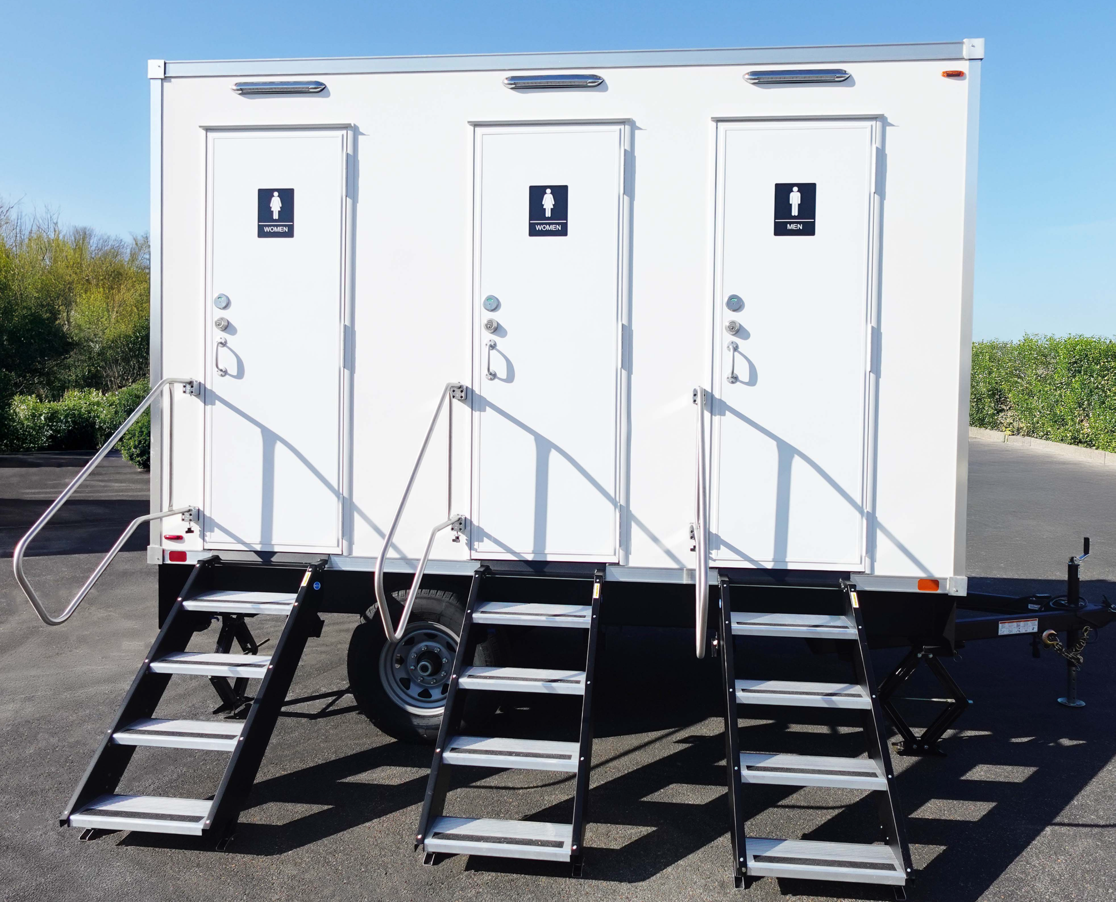 Exterior triple door view of luxury restroom trailer