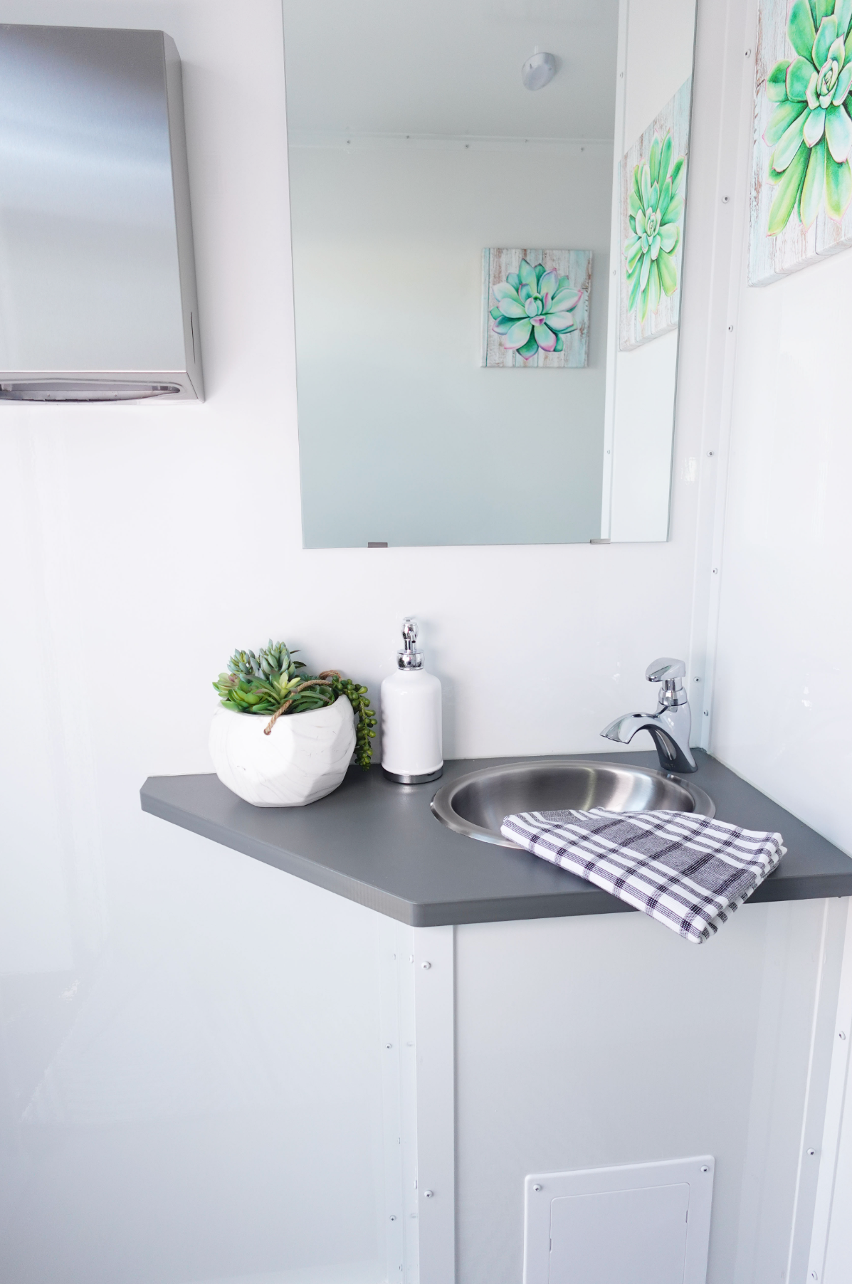 Interior vanity mirror and stainless steel sink