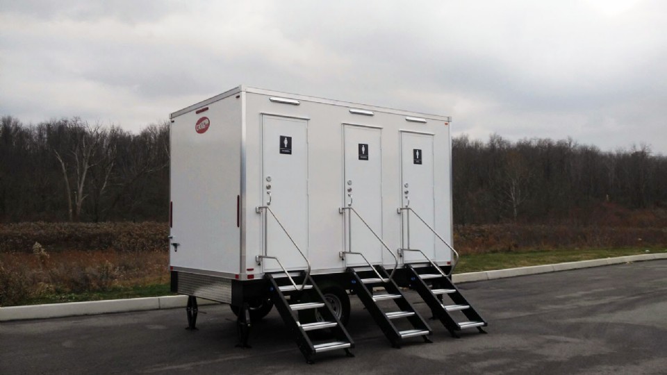 Luxury restroom trailer at corporate gala or golf outing